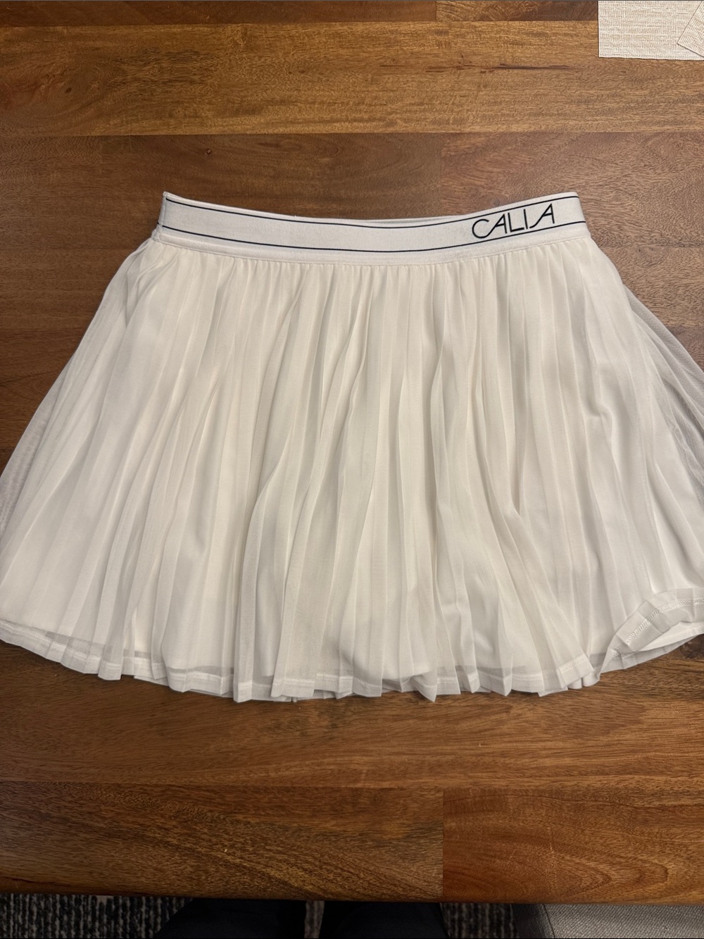 CALLA White Pleated Mini Skirt with Branded Waistband